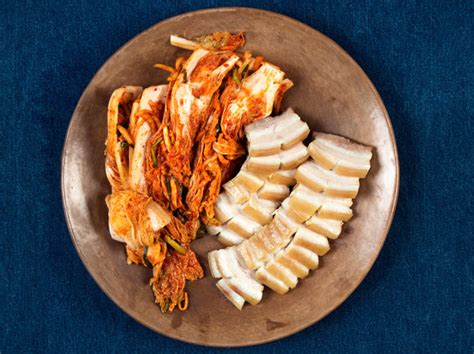 napa-cabbage-kimchi-with-steamed-pork-belly-nyt image