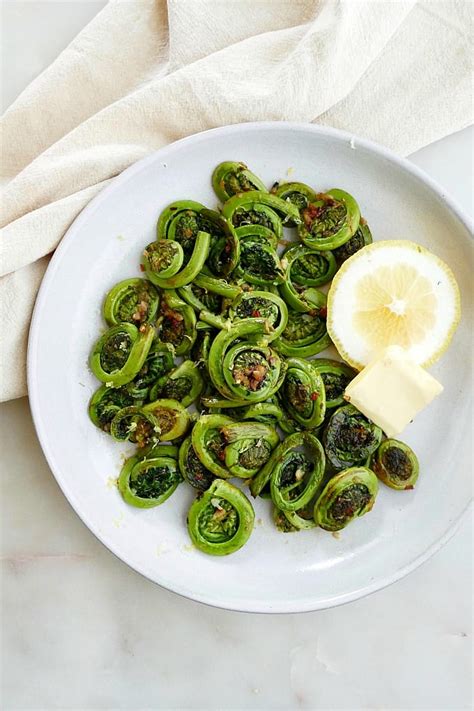 sauted-fiddleheads-with-garlic-lemon-butter image