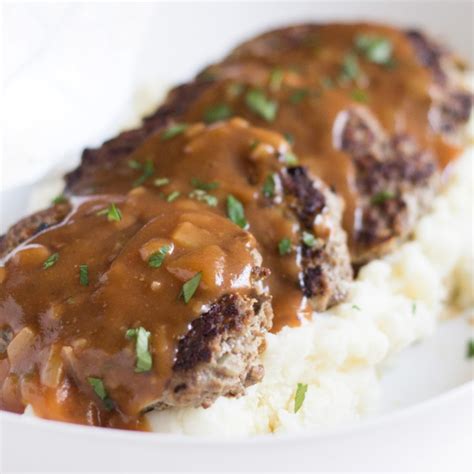 gravy-smoothered-cajun-style-meatloaf-patties image
