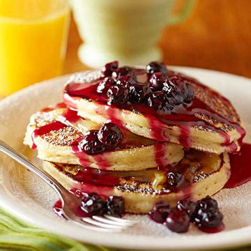 lemon-ricotta-pancakes-with-warm-blueberry-compote image