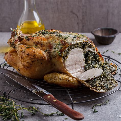 spinach-and-feta-stuffed-roast-chicken-simply-delicious image