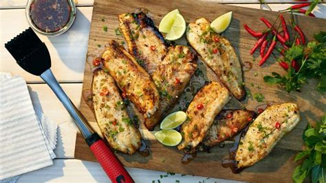 grilled-tilapia-with-ginger-scallion-sauce-char-broil image