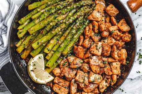 garlic-butter-chicken-bites-with-lemon-asparagus-eatwell101 image