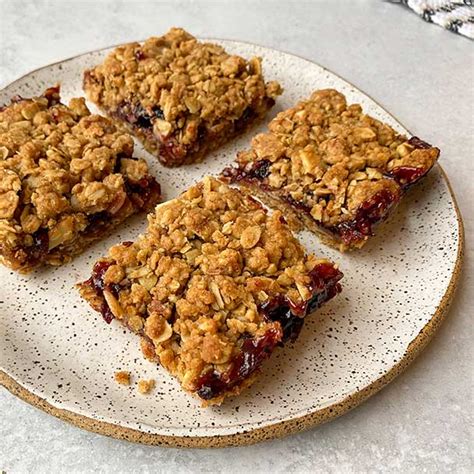 cherry-breakfast-bars-with-almonds-recipe-quaker-oats image