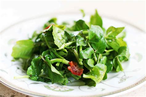 watercress-salad-with-warm-bacon-dressing image