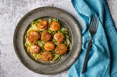 seared-scallops-with-zoodles-alex-guarnaschelli-iron image