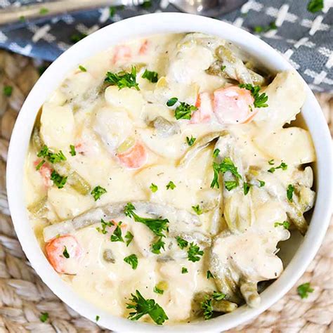 slow-cooker-creamy-chicken-stew-recipe-eating-on-a-dime image