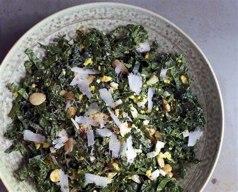 smoky-kale-salad-with-toasted-almonds-and-egg image