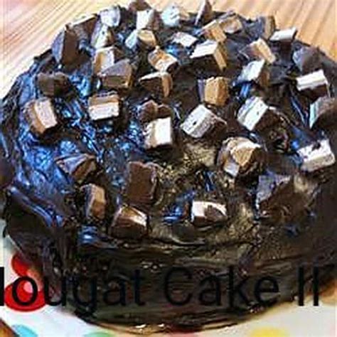 caramel-nougat-cake-ii-the-delish image