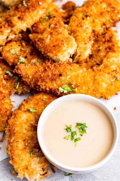 coconut-chicken-tenders-with-pina-colada-dip-easy image