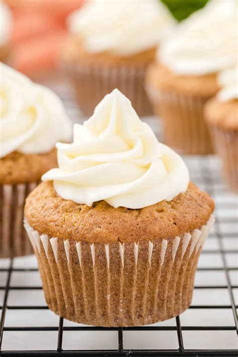 carrot-cake-cupcakes-with-cream-cheese-frosting image