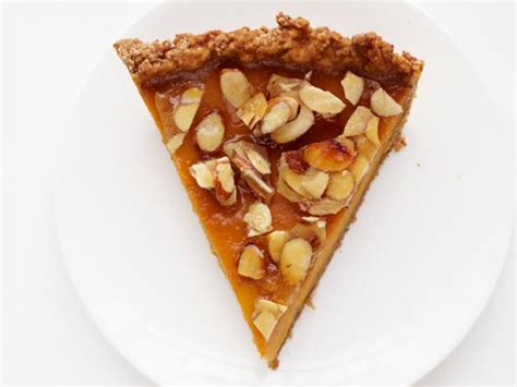 amaretto-pumpkin-pie-with-almond-praline-food-network image