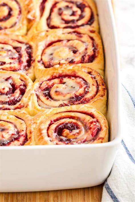 homemade-soft-cranberry-orange-rolls-plated-cravings image
