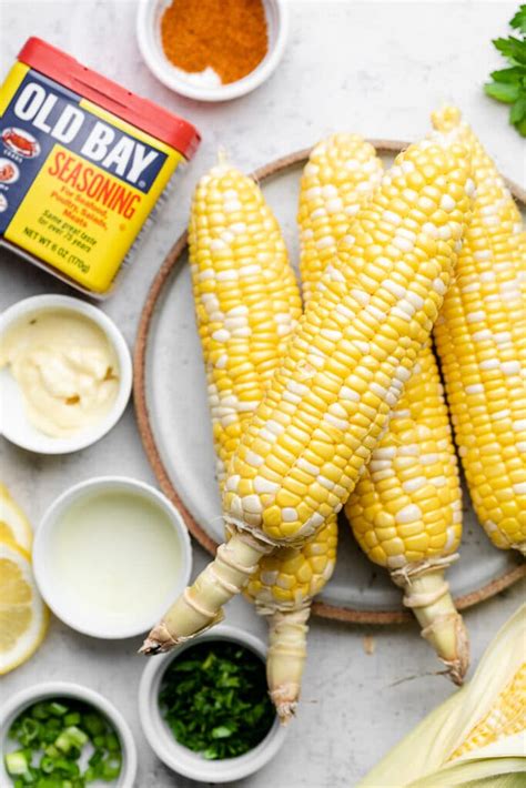 easy-grilled-corn-with-old-bay-mayo-eat-the-gains image