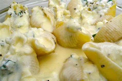 lemon-basil-ricotta-stuffed-shells-in-a-champagne image