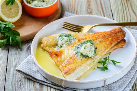 bass-with-lemon-herb-butter-recipe-the-spruce-eats image