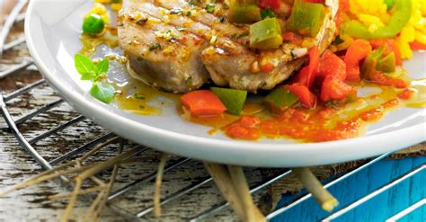 seared-tuna-steaks-with-stir-fried-bell-peppers-eat image