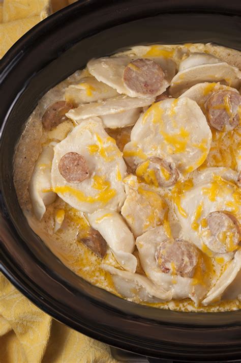crock-pot-sausage-pierogi-casserole-wishes-and-dishes image