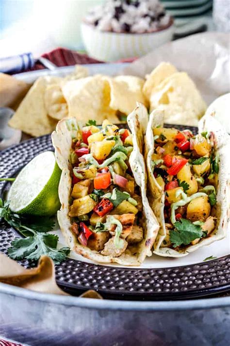 chili-lime-chicken-tacos-with-grilled-pineapple-salsa image