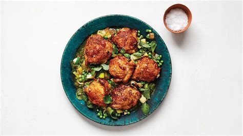 roast-chicken-thighs-with-peas-recipe-bon-apptit image