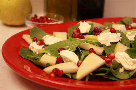 pomegranate-spinach-salad-with-pears-and-goat-cheese image