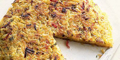 hash-browns-with-leeks-and-bell-peppers-recipe-delish image