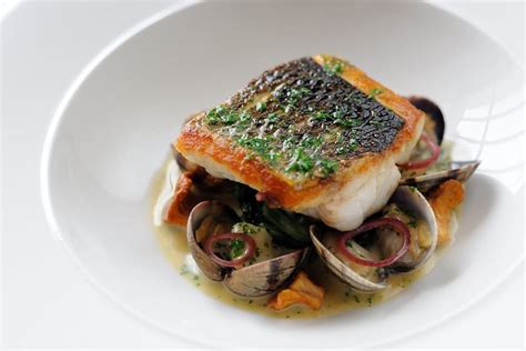 sea-bass-recipe-with-clams-poached-cod-cheeks image