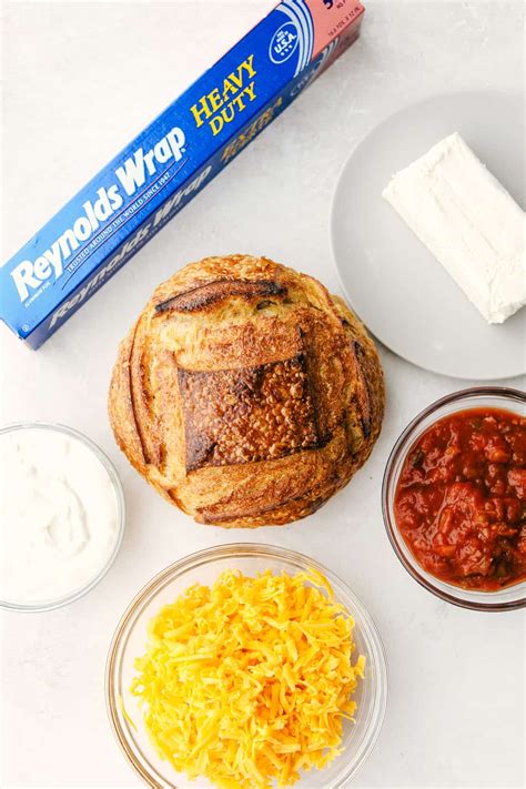 baked-cream-cheese-salsa-dip-in-a-bread-bowl-the image