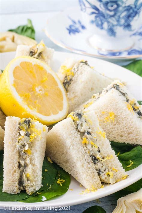 spinach-artichoke-tea-sandwiches-with-lemon-pinch image