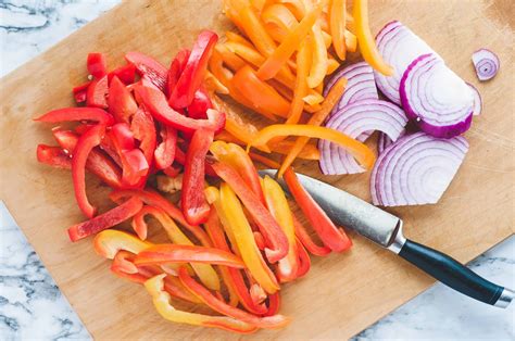 simple-oven-roasted-bell-pepper-strips-and-onions image
