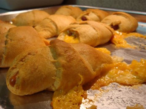cheese-stuffed-pigs-in-a-blanket-tasty-kitchen-a image