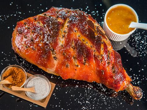 roasted-pork-leg-with-apricot-glaze-so-delicious image