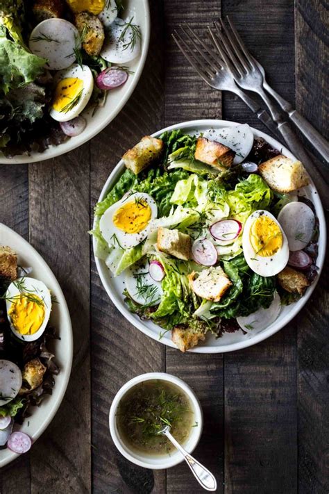spring-salad-with-garlic-scape-herbed-croutons image