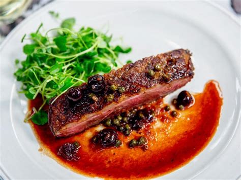 crispy-duck-breast-with-caper-cherry-sauce-food image
