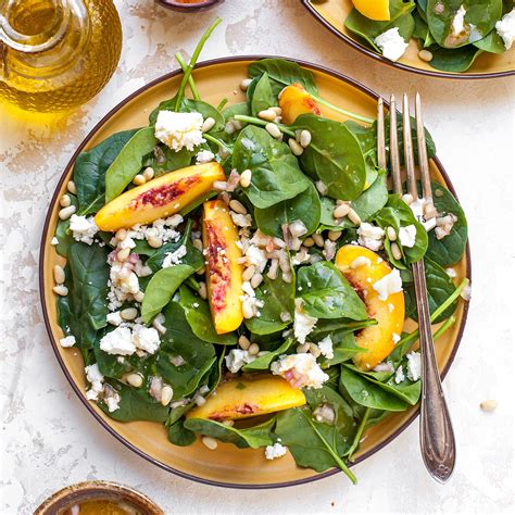 peach-spinach-salad-with-feta-eatingwell image