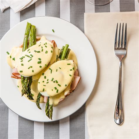 eggs-benedict-with-ham-and-roasted-asparagus image