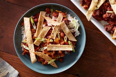 mexican-spiced-beef-rice-casserole-with-crispy-tortilla-strips image