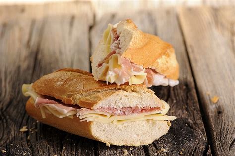 baked-ham-and-cheese-party-sandwiches-food image
