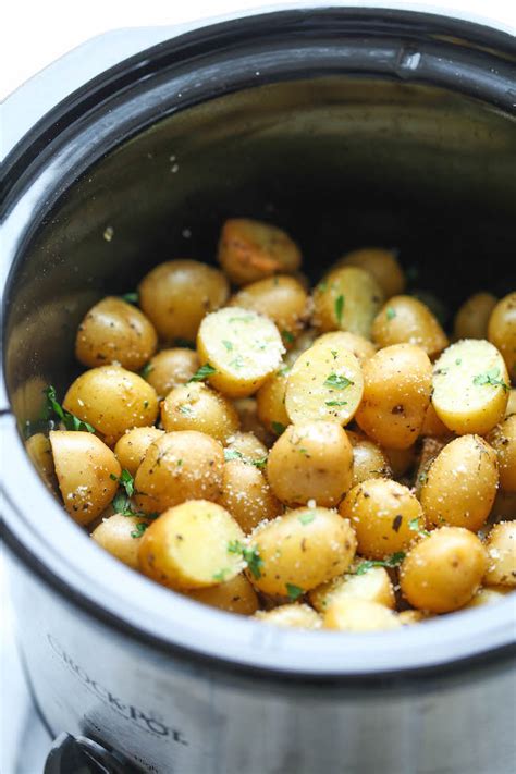 slow-cooker-garlic-parmesan-potatoes-damn-delicious image