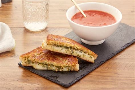 pesto-grilled-cheese-sandwiches-with-spicy-tomato-soup image