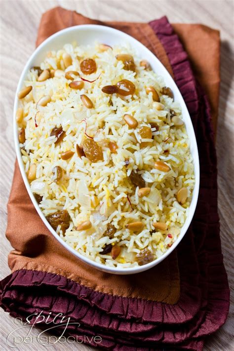 saffron-rice-with-golden-raisins-and-pine-nuts-a-spicy image