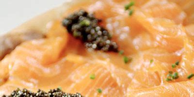 pizza-with-smoked-salmon-and-caviar-recipe-delish image