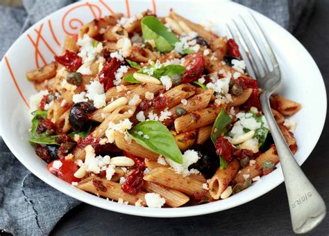 sun-dried-tomato-penne-pasta-salad-with-goat-cheese image
