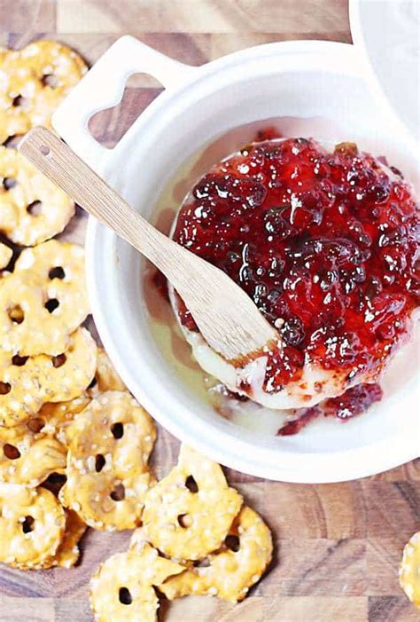 heavenly-baked-brie-with-sweet-pepper-jelly-half image