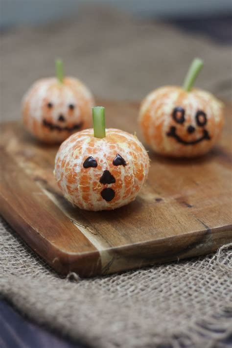 halloween-banana-ghosts-and-clementine-pumpkins image