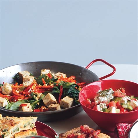 spicy-thai-tofu-with-red-bell-peppers-and-peanuts image