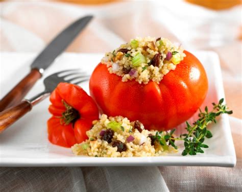 quinoa-and-raisin-salad-stuffed-in-tomatoes-spry image