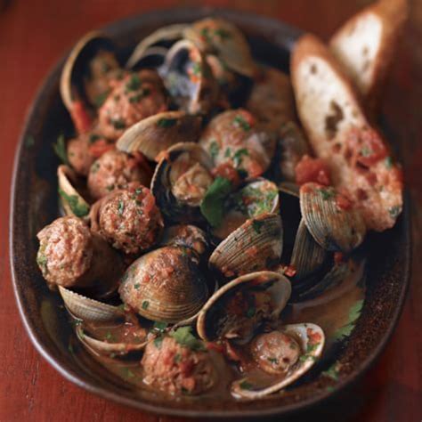 clams-with-white-wine-tomatoes-and-sausages image