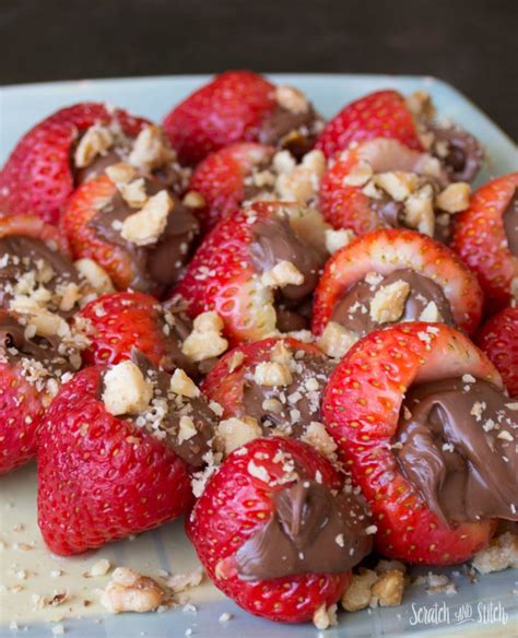 nutella-stuffed-strawberries-recipe-on-scratch-and-stitch image