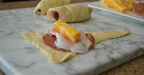 easy-turkey-and-cheese-roll-ups-hip2save image
